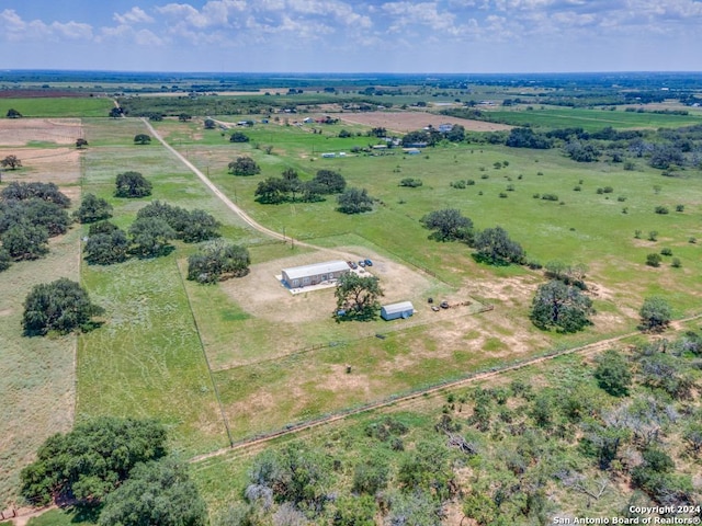 birds eye view of property featuring a rural view