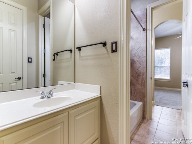 bathroom featuring vanity, shower / tub combination, and tile patterned floors