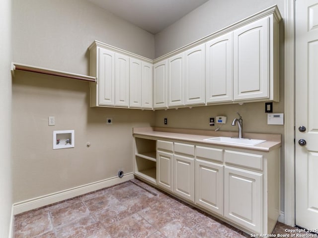 laundry room with gas dryer hookup, sink, cabinets, washer hookup, and hookup for an electric dryer