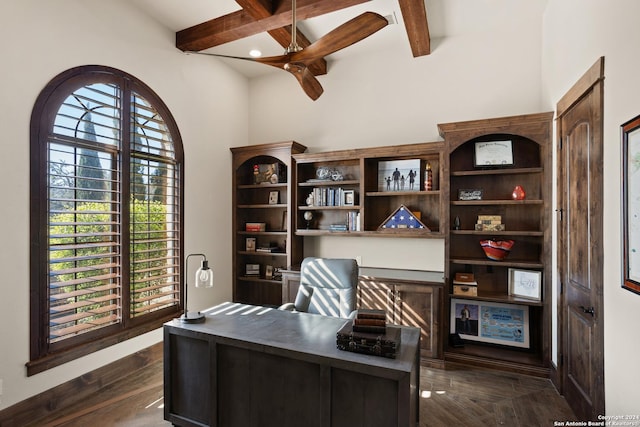 home office with beam ceiling and dark wood-type flooring