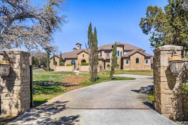 view of front of home with a front lawn