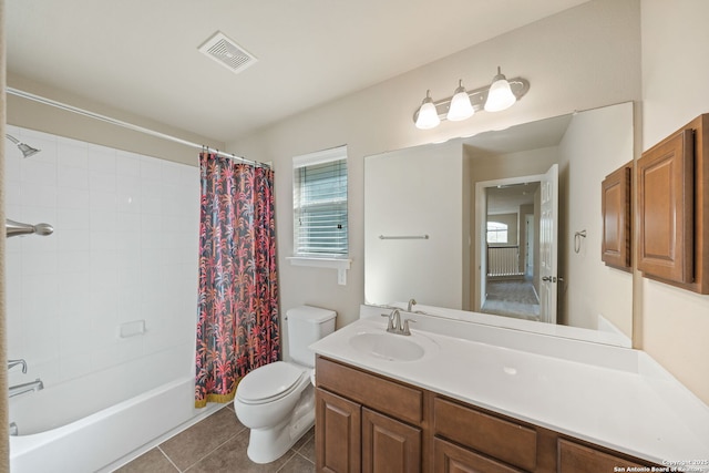 full bathroom with vanity, shower / bath combo, tile patterned floors, and toilet