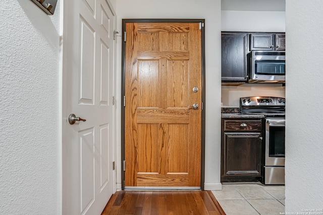 kitchen featuring appliances with stainless steel finishes and light wood-type flooring