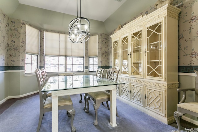 dining area featuring an inviting chandelier, plenty of natural light, and carpet