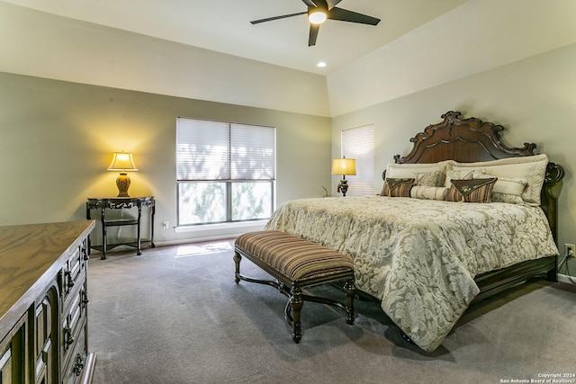 carpeted bedroom featuring ceiling fan and vaulted ceiling