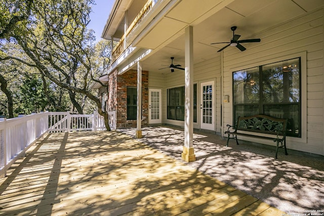 wooden deck with ceiling fan