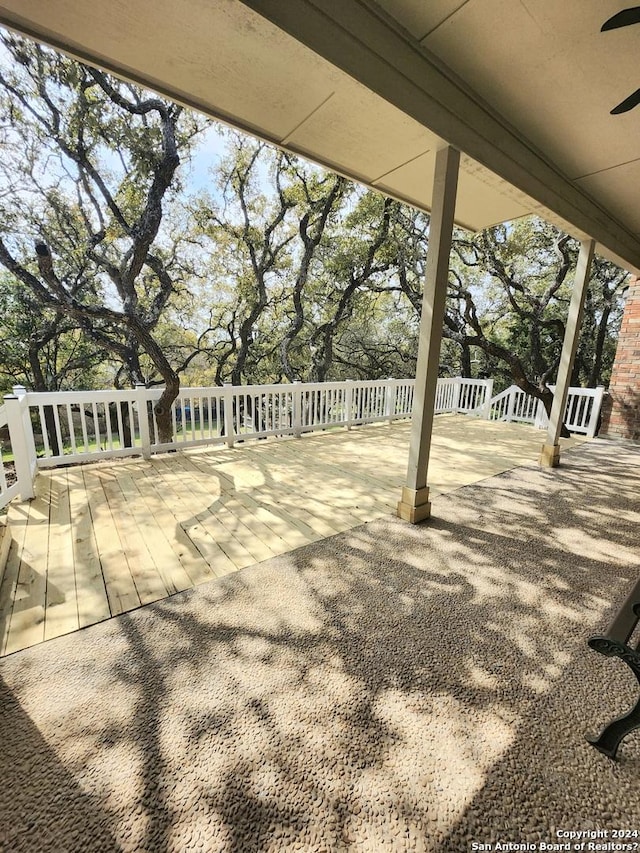 view of patio featuring ceiling fan