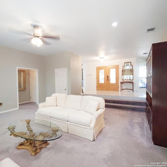 living room with ceiling fan