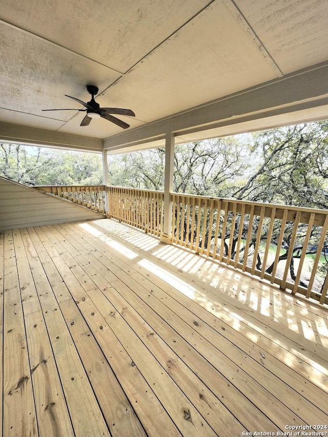 wooden deck with ceiling fan