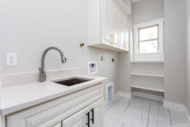 laundry area featuring cabinets, hookup for a washing machine, sink, and hookup for an electric dryer