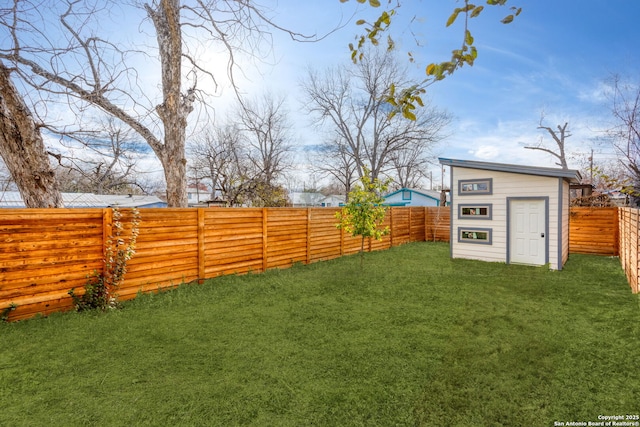 view of yard with a storage unit