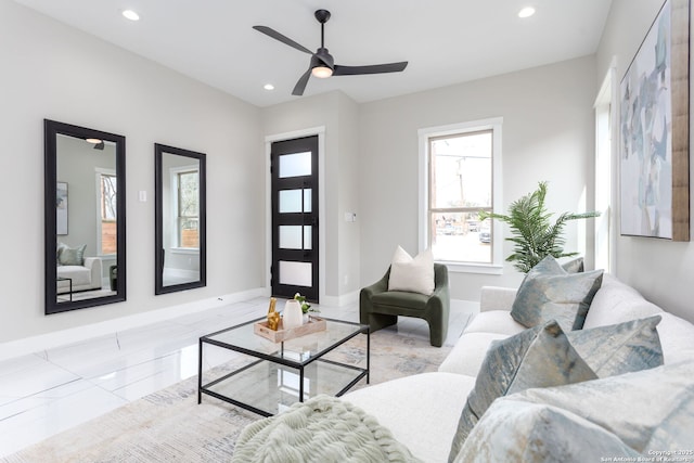 living room with ceiling fan