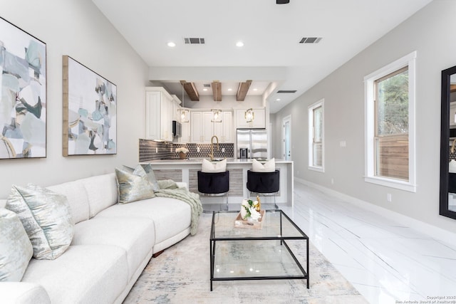 living room with sink