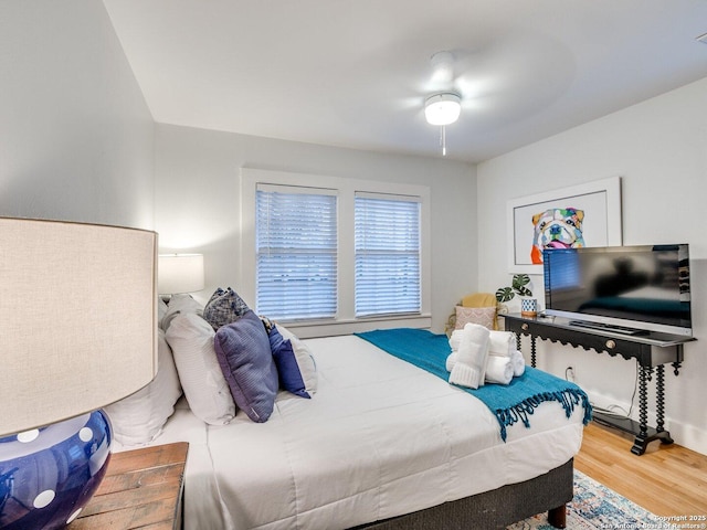337 W Hackberry St, Fredericksburg, TX 78624 - bedroom featuring hardwood / wood-style flooring and ceiling fan