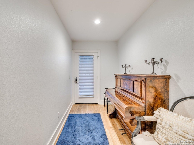 miscellaneous room with light wood-type flooring