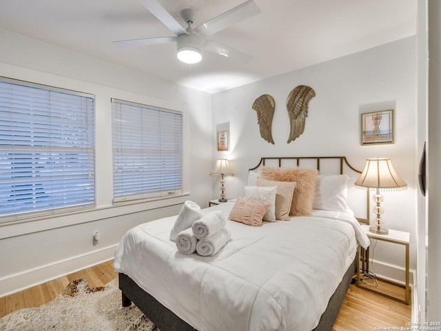 337 W Hackberry St, Fredericksburg, TX 78624 - bedroom featuring light hardwood / wood-style flooring and ceiling fan