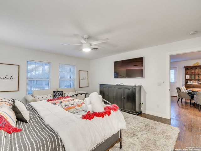 337 W Hackberry St, Fredericksburg, TX 78624 - bedroom with dark wood-type flooring and ceiling fan