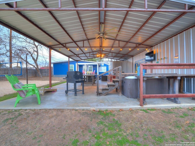 337 W Hackberry St, Fredericksburg, TX 78624 - view of patio / terrace with a hot tub and a storage shed