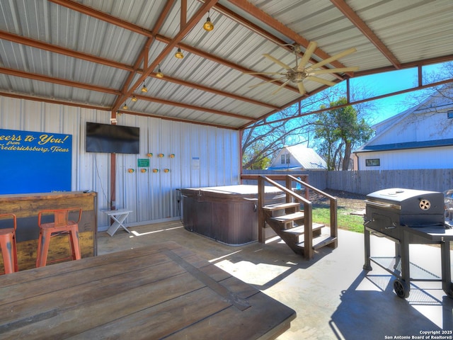 337 W Hackberry St, Fredericksburg, TX 78624 - view of patio / terrace featuring exterior bar, ceiling fan, grilling area, and a hot tub