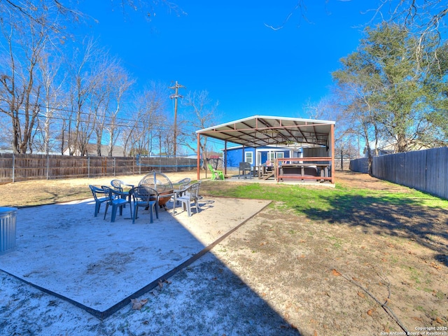 337 W Hackberry St, Fredericksburg, TX 78624 - view of yard featuring a hot tub, a patio area, and a fire pit