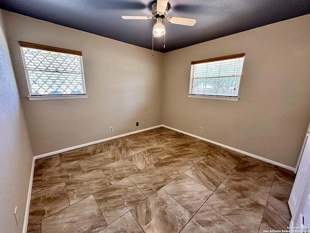 empty room with ceiling fan