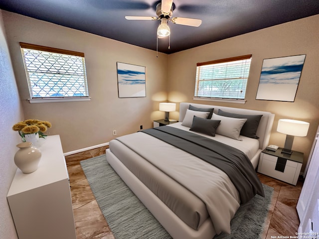 bedroom featuring ceiling fan