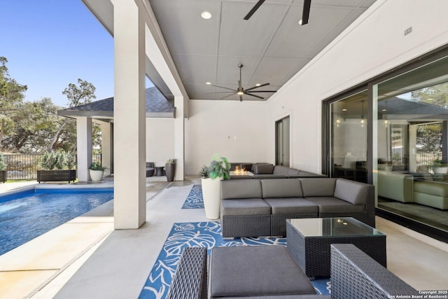 view of patio with ceiling fan, outdoor lounge area, and a fenced in pool