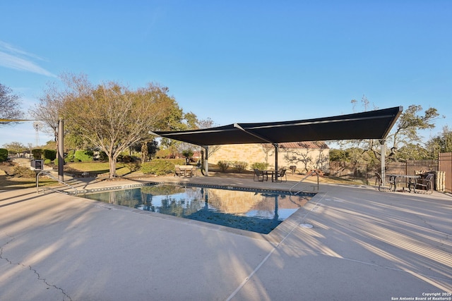 view of pool featuring a patio