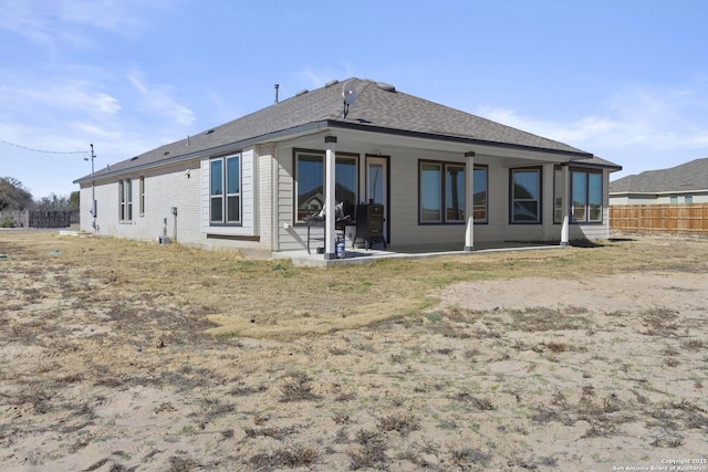 back of property featuring a patio