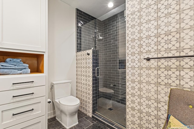 31545 Meadow Crk, Fair Oaks Ranch, TX 78015 - bathroom featuring tile patterned floors, a shower stall, and toilet