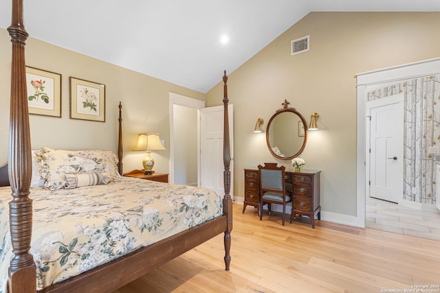 31545 Meadow Crk, Fair Oaks Ranch, TX 78015 - bedroom with visible vents, baseboards, wood finished floors, and high vaulted ceiling