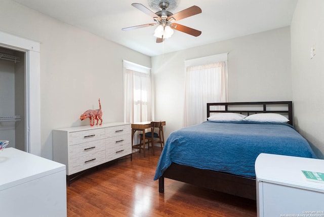 bedroom featuring dark wood-type flooring and ceiling fan