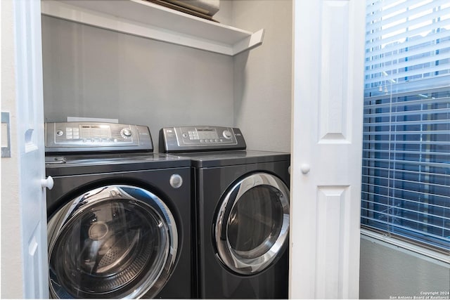 laundry room featuring washer and clothes dryer