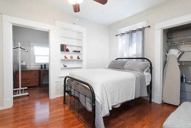 bedroom with ceiling fan and dark hardwood / wood-style floors