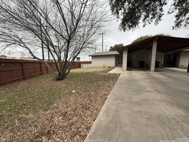 view of yard with a carport