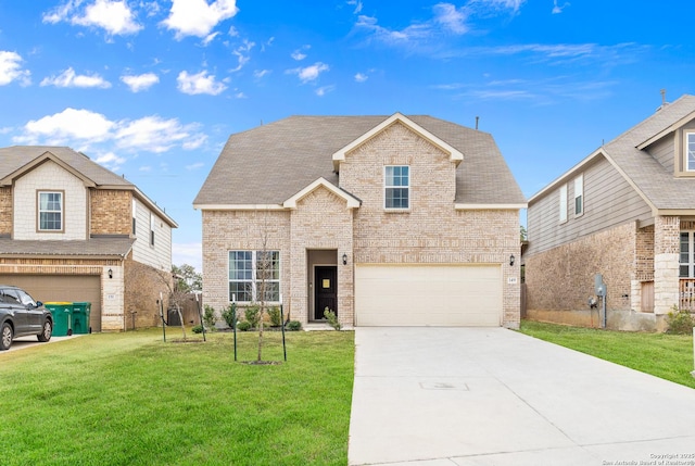 view of front facade with a garage and a front yard