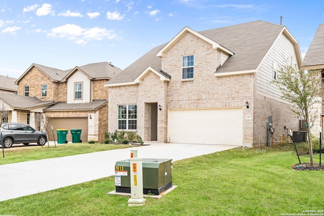 view of front of home featuring a garage and a front yard