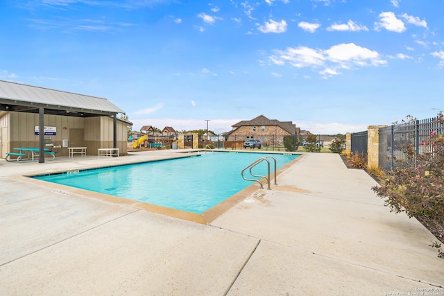 view of pool featuring a patio area