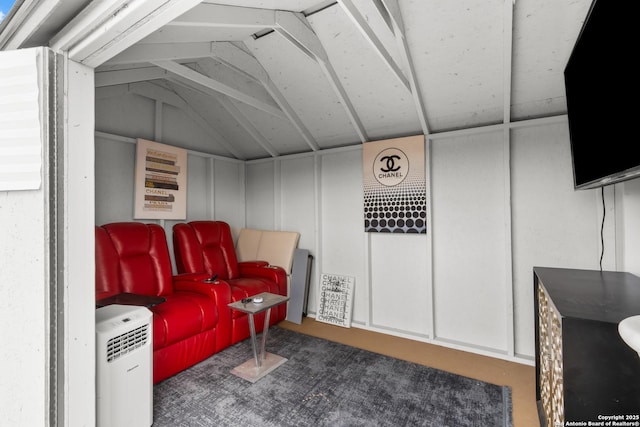 home theater featuring lofted ceiling