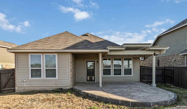 back of property with a patio area