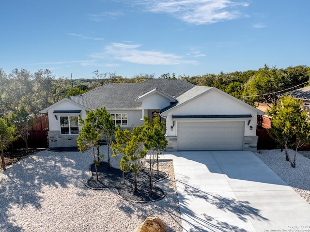 ranch-style house featuring a garage