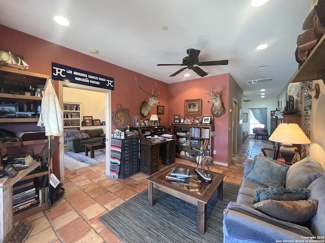 living room featuring ceiling fan