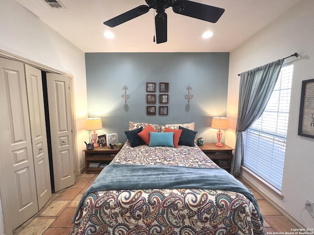 bedroom with a closet and ceiling fan