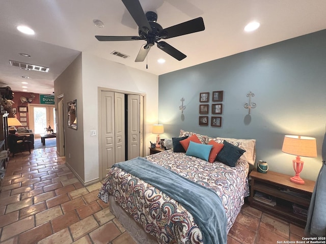 bedroom with a closet and ceiling fan