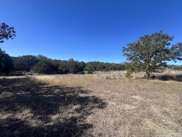 view of landscape with a rural view