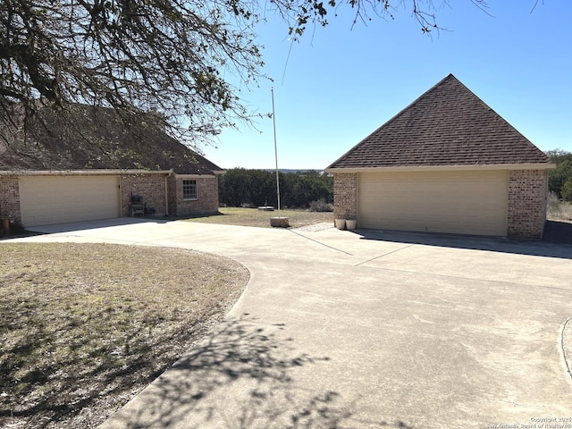 view of property exterior featuring a garage