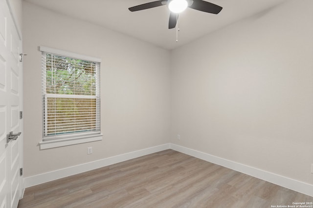 unfurnished room featuring ceiling fan and light hardwood / wood-style flooring