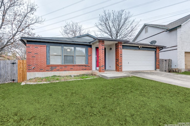 view of front of house with a garage and a front lawn