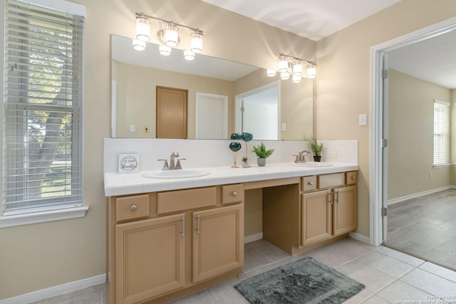 bathroom with tasteful backsplash, vanity, and tile patterned floors