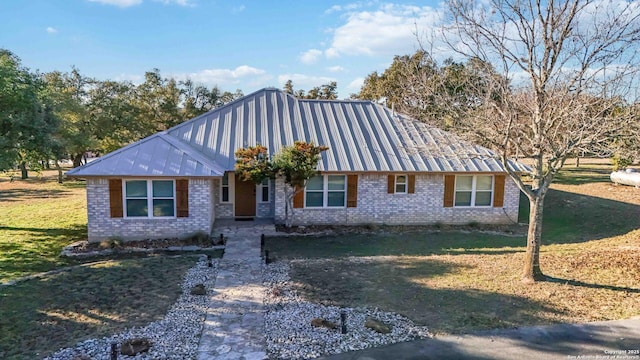 view of front of property with a front lawn